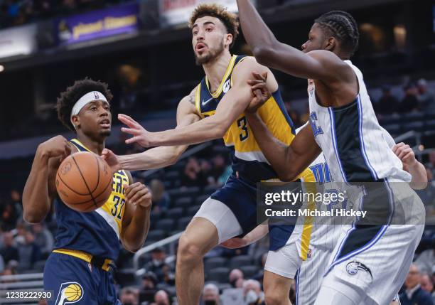 Chris Duarte of the Indiana Pacers passes the ball during the game against the Orlando Magic at Gainbridge Fieldhouse on February 2, 2022 in...