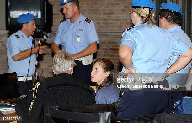 Amanda Knox attends her appeal hearing to reconsider her guilty verdict in the murder of Meredith Kercher, at Perugia's Court of Appeal on September...