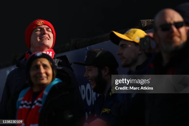 Manchester United fans crane their necks to get a view during the Barclays FA Women's Super League match between Arsenal Women and Manchester United...