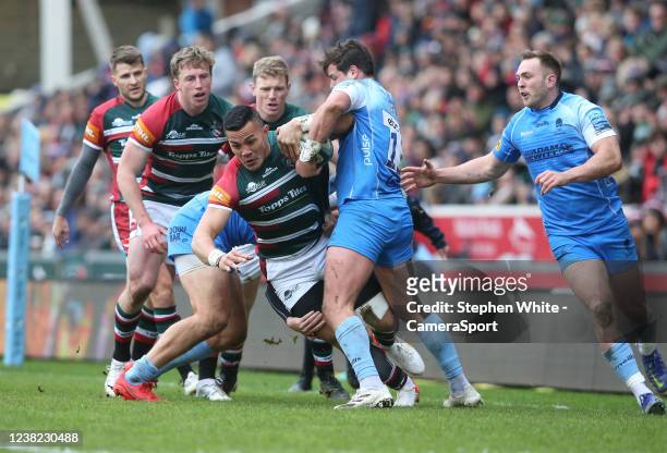 Leicester Tigers' Hosea Saumaki is tackled by Worcester Warriors' Francois Venter during the Gallagher Premiership Rugby match between Leicester...