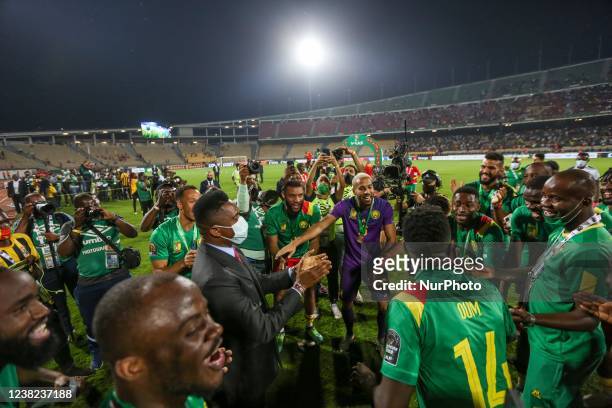 Cameroon's players and former Cameroonian football player Samuel Eto'o celebrate their bronze medal at the end of the Africa Cup of Nations 2021...