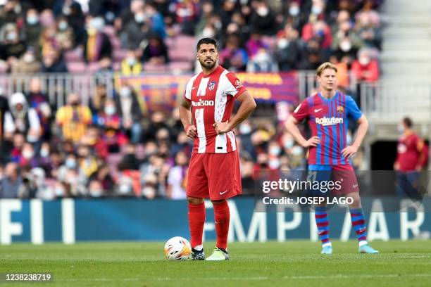 Atletico Madrid's Uruguayan forward Luis Suarez reacts during the Spanish league football match between FC Barcelona and Club Atletico de Madrid at...