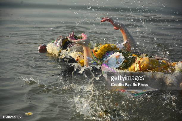 Immersion of Saraswati idol in the river of the Ganges. Many people including women came to celebrate this Hindu ritual. Vasant Panchami, also called...