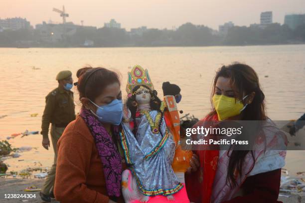 Immersion of Saraswati idol in the river of the Ganges. Many people including women came to celebrate this Hindu ritual. Vasant Panchami, also called...