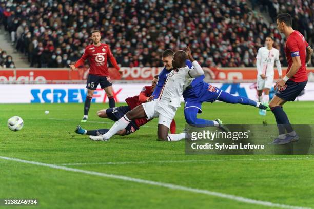 Danilo Pereira of Paris SG shoots to score his side's 1st goal during the Ligue 1 Uber Eats match between Lille OSC and Paris Saint Germain at Stade...