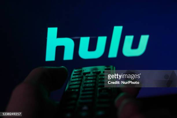 Remote control is seen with Hulu logo displayed on a screen in this illustration photo taken in Krakow, Poland on February 6, 2022.