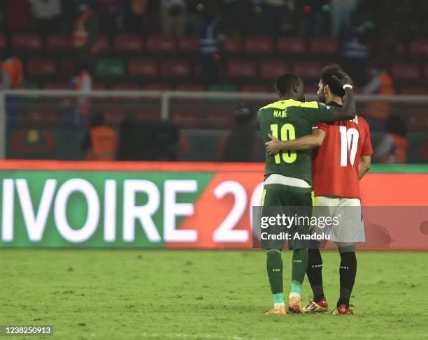 Senegal's Sadio Mane consoles Egypt's Mohamed Salah at the end of the Africa Cup of Nations 2021 final match between Senegal and Egypt at Stade...