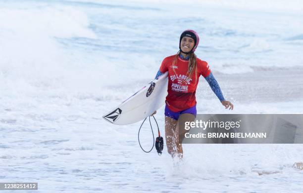 Hawaiis Moana Jones Wong comes out of the water at the end of her heat during the 2022 Women's Billabong pipeline pro finals at Banzai Pipeline on...