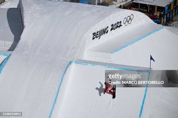 Canada's Max Parrot competes in the snowboard men's slopestyle final run during the Beijing 2022 Winter Olympic Games at the Genting Snow Park H & S...