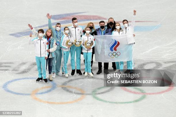 Gold medallists Russia's Kamila Valieva, Russia's Mark Kondratiuk, Russia's Anastasia Mishina, Russia's Aleksandr Galliamov, Russia's Victoria...