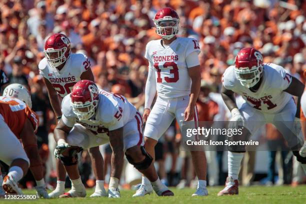 Oklahoma Sooners quarterback Caleb Williams gets set for a play against the Texas Longhorns on October 9th, 2021 at Cotton Bowl Stadium in Dallas,...