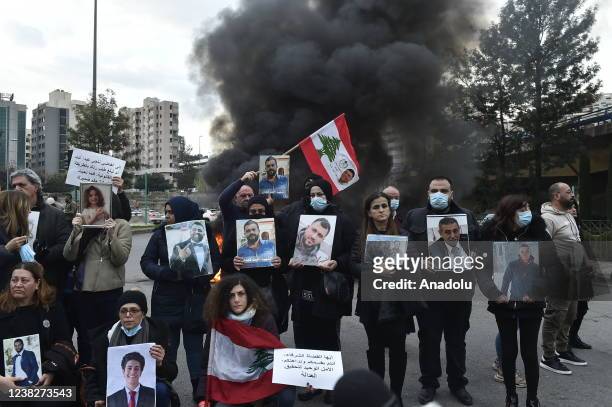 Relatives of victims of the 04 August Beirut port explosion stage a protest in front of the Justice Palace in Beirut, Lebanon, 07 February 2022....