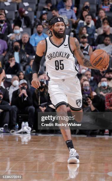 DeAndre' Bembry of the Brooklyn Nets brings the ball up the court against the Sacramento Kings on February 2, 2022 at Golden 1 Center in Sacramento,...