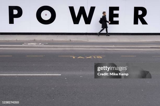 Power text on hoardings surrounding the redevelopment of Battersea Power Station and its surroundings on 3rd February 2022 in London, England, United...