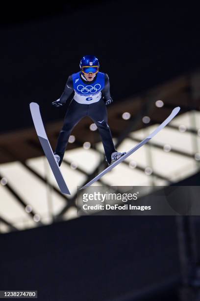 Ryoyu Kobayashi of Japan in action competes during the ski jumping mixed relay during the Beijing 2022 Winter Olympics at National Ski Jumping Centre...