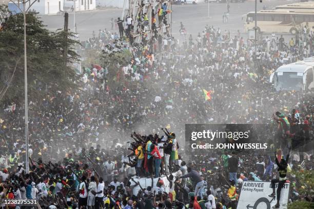 Supporters cheer the Senegalese Football teams tour in Dakar on February 07 after winning, for the first time, the Africa Cup of Nations. - Senegal's...