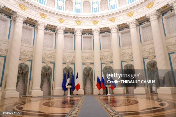 Russian President Vladimir Putin and French President Emmanuel Macron give a joint press conference after meeting in Moscow, on February 7, 2022. -...