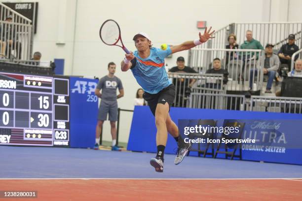 Kevin Anderson stretches for a forehand during the first round of the Dallas Open on February 7, 2022 at the Styslinger/Altec Tennis Complex in...