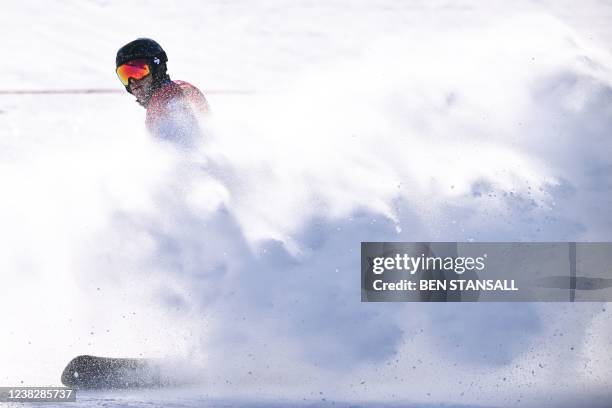 Italy's Roland Fischnaller competes in the snowboard men's parallel giant slalom quarter-finals during the Beijing 2022 Winter Olympic Games at the...