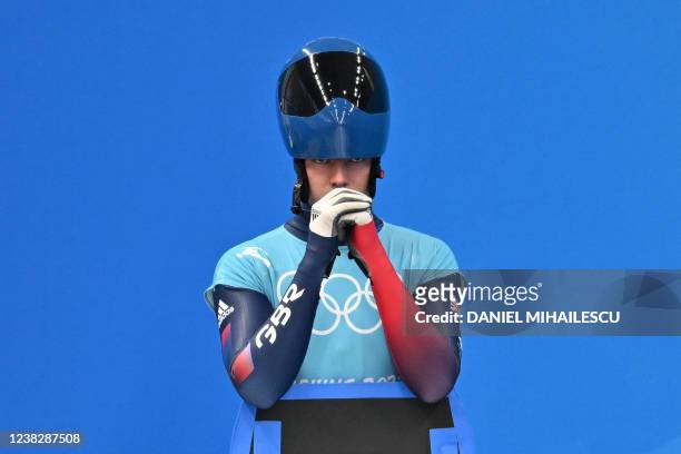 Britain's Matt Weston prepares to take part in the men's skeleton training at the Yanqing National Sliding Centre during the Beijing 2022 Winter...