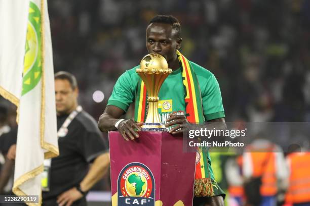 Sadio Mané of Senegal team celebrate with victory by kiss the cup after the 2021 Africa Cup of Nations final soccer match between Senegal and Egypt...