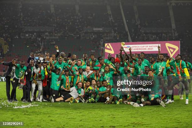 Senegal players celebrate with the trophy after winning the 2021 Africa Cup of Nations final soccer match against Egypt at the Paul Biya 'Olembe'...