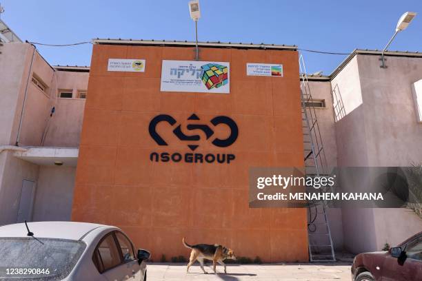 The NSO Group company logo is displayed on a wall of a building next to one of their branches in the southern Israeli Arava valley near Sapir...