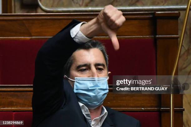 French leftist La France Insoumise party's MP François Ruffin reacts during a session of questions to the government at The National Assembly in...