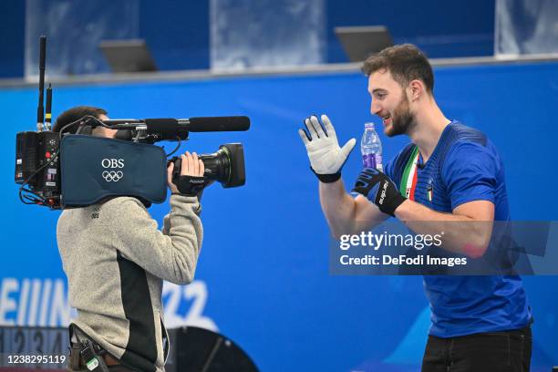 Amos Mosaner of Italy celebrates after the win at the Mixed Doubles Gold Medal Game Results - Olympic Curling - Italy vs Norway during the Beijing...