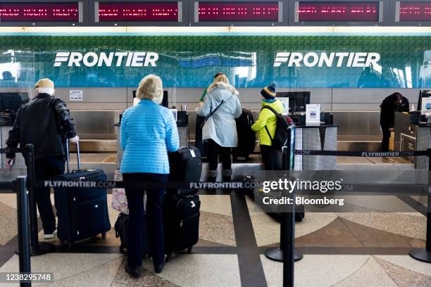 Frontier Check In Frontier Air Lines Photos and Premium High Res Pictures - Getty Images