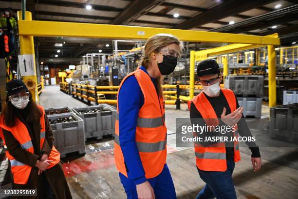 Interior Minister Annelies Verlinden pictured during a press moment for a new reusable bottles production line in Stella Artois brewery in Leuven,...