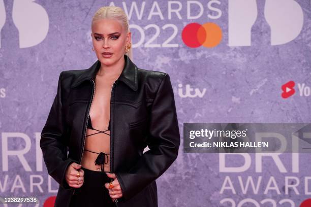 British singer Anne-Marie Rose Nicholson aka Anne-Marie poses on the red carpet upon her arrival for the BRIT Awards 2022 in London on February 8,...