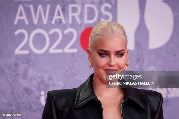British singer Anne-Marie Rose Nicholson aka Anne-Marie poses on the red carpet upon her arrival for the BRIT Awards 2022 in London on February 8,...