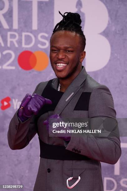 British rapper Olajide Olayinka Williams Olatunji aka KSI poses on the red carpet upon his arrival for the BRIT Awards 2022 in London on February 8,...