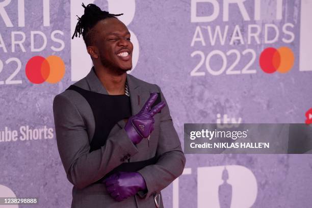 British rapper Olajide Olayinka Williams Olatunji aka KSI poses on the red carpet upon his arrival for the BRIT Awards 2022 in London on February 8,...