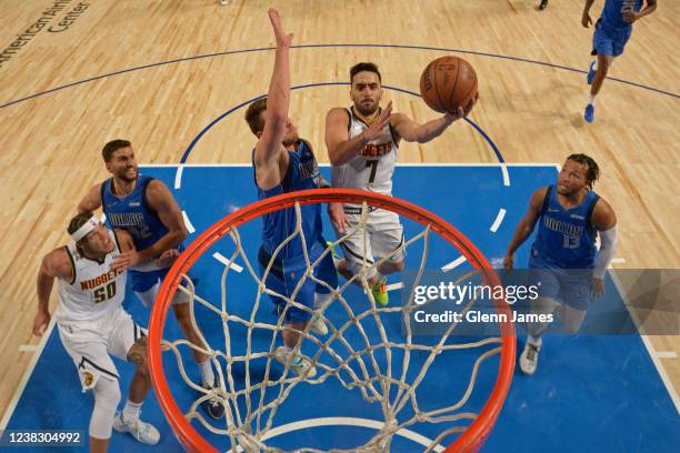 Facundo Campazzo of the Denver Nuggets drives to the basket during the game against the Dallas Mavericks on January 3, 2022 at the American Airlines...