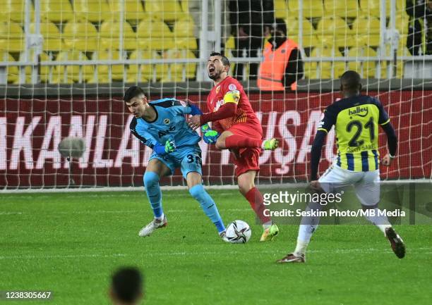 Goalkeeper Berke Ozer of Fenerbahce and Emrah Bassan of Kayserispor in action during the Turkish Cup Match between Fenerbahce and Kayserispor at...
