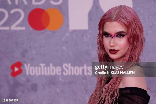 British TikTok influencer Abby Roberts poses on the red carpet upon her arrival for the BRIT Awards 2022 in London on February 8, 2022. - RESTRICTED...