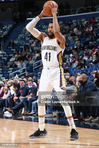 Garrett Temple of the New Orleans Pelicans looks to pass the ball during the game against the Houston Rockets on February 8, 2022 at the Smoothie...