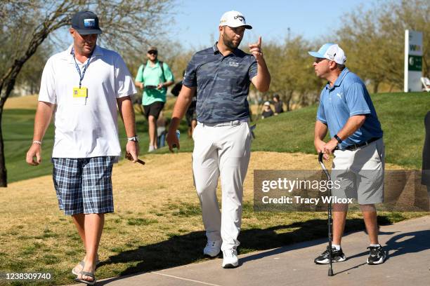 Jon Rahm of Spain greets D.J. Gregory who received the 2022 PGA TOUR Courage Award prior to the WM Phoenix Open at TPC Scottsdale on February 8, 2022...