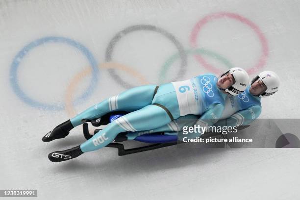 February 2022, China, Yanqing: Olympics, luge, doubles, 1st run at the National Sliding Centre. Andrei Bogdanov and Yuri Prokorov of the Russian...