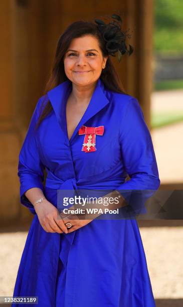 Actress Nina Wadia poses with her OBE following an investiture ceremony at Windsor Castle on February 9, 2022 in Windsor, England.