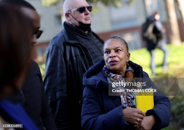 French presidential candidate Christiane Taubira speaks with residents of Montreuil, east of Paris, on February 9, 2022. During an electoral visit to...