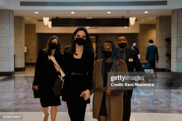 Actress Angelina Jolie walks with her daughter Zahara Jolie-Pitt through the Capitol Visitors Center after Jolie spoke at a news conference on the...