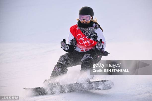 S Chloe Kim reacts after her run in the snowboard women's halfpipe final run during the Beijing 2022 Winter Olympic Games at the Genting Snow Park H...