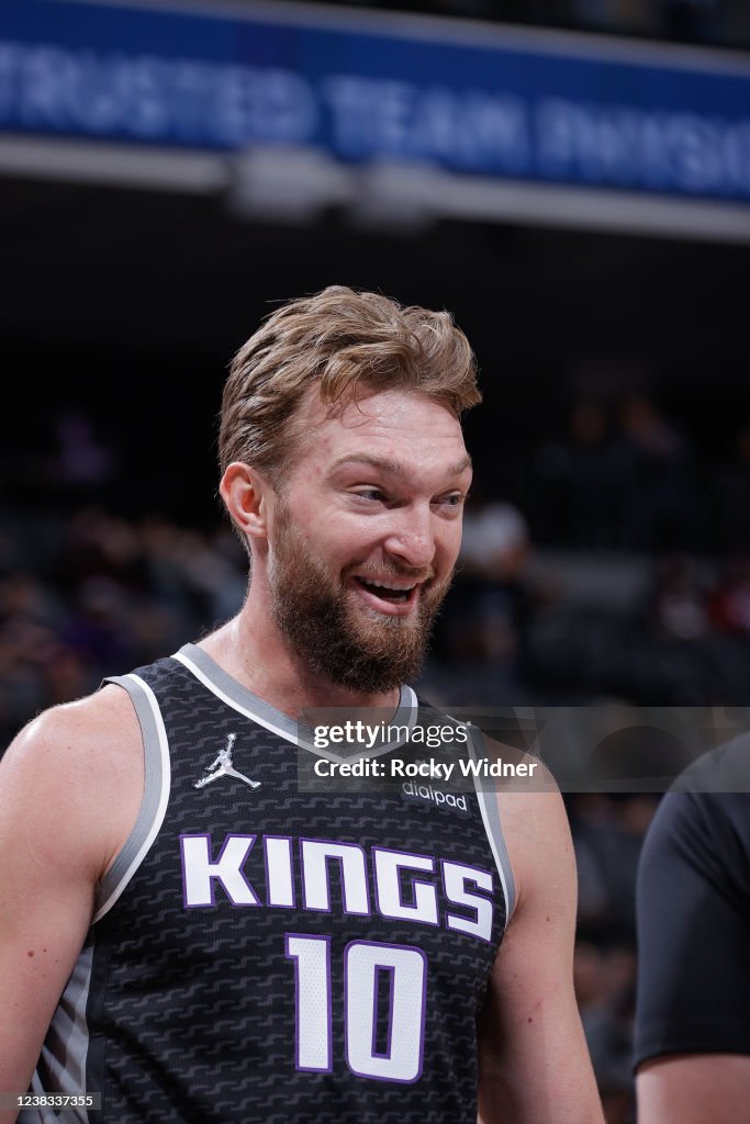 Domantas Sabonis of the Sacramento Kings smiles during the game... News ...
