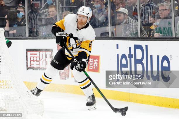 Pittsburgh Penguins defenseman Mike Matheson passes the puck during a game between the Boston Bruins and the Pittsburgh Penguins on February 8 at TD...
