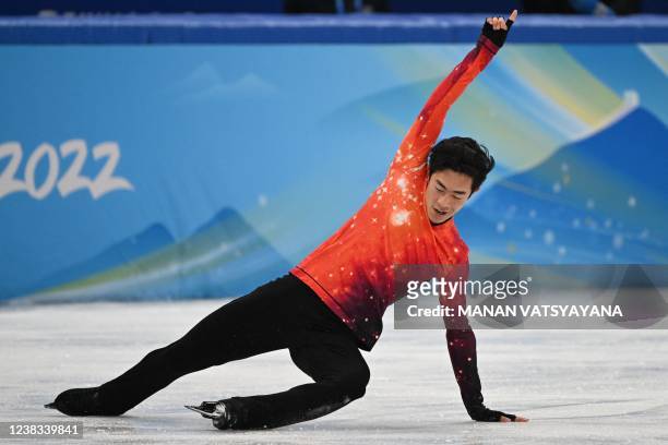 S Nathan Chen competes in the men's single skating free skating of the figure skating event during the Beijing 2022 Winter Olympic Games at the...