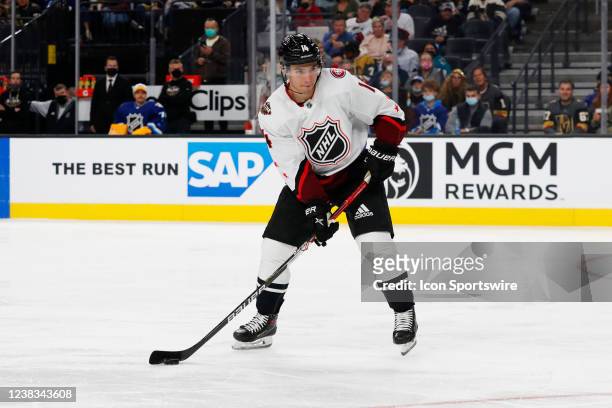 Nick Suzuki Montreal Canadiens forward looks to pass the puck during the Honda NHL All-Star game on February 5, 2022 at T-Mobile Arena in Las Vegas,...