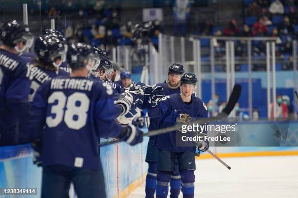 Sakari Manninen of Team Finland celebrate with the team mates after he scores the equalizing goal in the first perio during the Men's Ice Hockey...